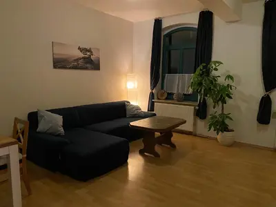 Ein Sitzbereich in der Unterkunft Ferienwohnung am Stadtgraben