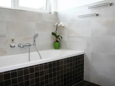 Ein Badezimmer in der Unterkunft Ferienwohnung Penthaus ILSE