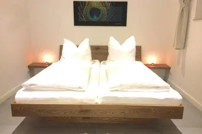Ein Bett oder Betten in einem Zimmer der Unterkunft Elegantes Haus im Dresdner Süden