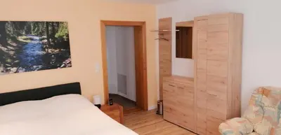 Ein Bett oder Betten in einem Zimmer der Unterkunft Ferienhaus Köhler