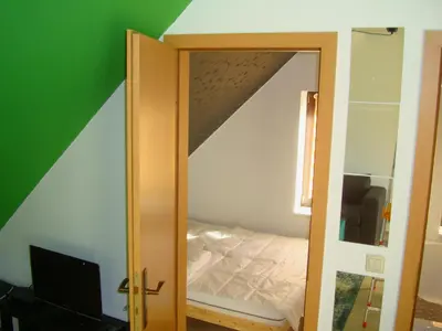 Ein Bett oder Betten in einem Zimmer der Unterkunft Fewo-Rammenau Monteurunterkunft