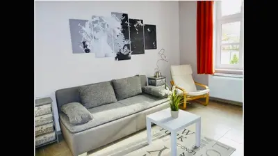 Ein Sitzbereich in der Unterkunft Villa FeWo mit separaten Schlafmöglichkeiten, zentral gelegen