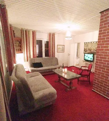 Ein Sitzbereich in der Unterkunft Elbenland Apartments
