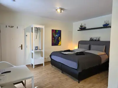 Ein Bett oder Betten in einem Zimmer der Unterkunft Papageiennest