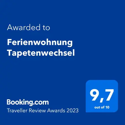 Ein Zertifikat, Auszeichnung, Logo oder anderes Dokument, das in der Unterkunft Ferienwohnung Tapetenwechsel -Balkon- ausgestellt ist