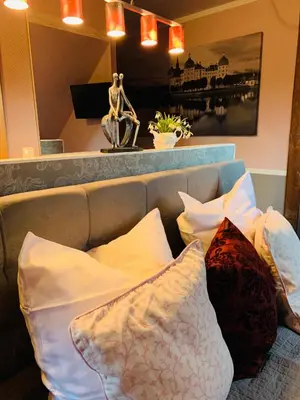 Ein Bett oder Betten in einem Zimmer der Unterkunft Restaurant und Pension Zur Puppenstube