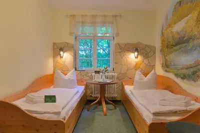 Ein Bett oder Betten in einem Zimmer der Unterkunft Gasthof Ungerberg