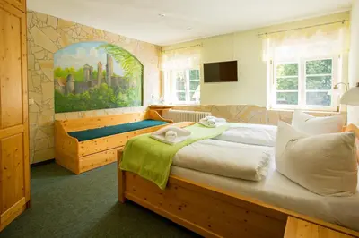 Ein Bett oder Betten in einem Zimmer der Unterkunft Gasthof Ungerberg