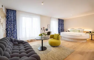 Ein Bett oder Betten in einem Zimmer der Unterkunft ARCOTEL HafenCity Dresden