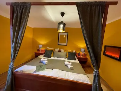 Ein Bett oder Betten in einem Zimmer der Unterkunft Berghotel Drei Brüder Höhe