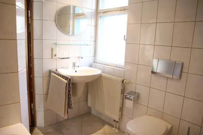 Ein Badezimmer in der Unterkunft Landhaus Büttner Altenberg