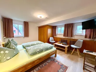 Ein Bett oder Betten in einem Zimmer der Unterkunft Landhaus Büttner Altenberg