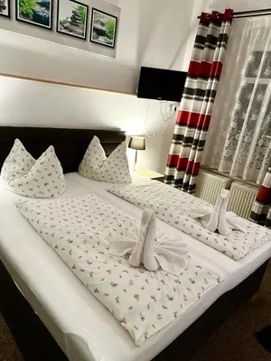 Ein Bett oder Betten in einem Zimmer der Unterkunft Helenenhof