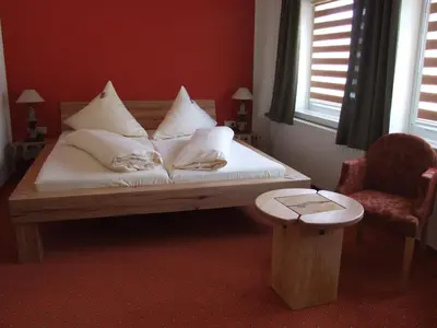 Ein Bett oder Betten in einem Zimmer der Unterkunft Hotel Goldener Stern