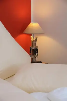 Ein Bett oder Betten in einem Zimmer der Unterkunft Hotel Goldener Stern