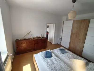 Ein Bett oder Betten in einem Zimmer der Unterkunft FeWo am Elbhang