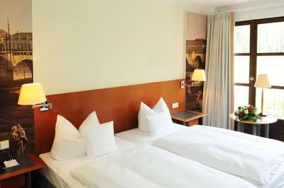 Ein Bett oder Betten in einem Zimmer der Unterkunft Hotel Schloss Eckberg