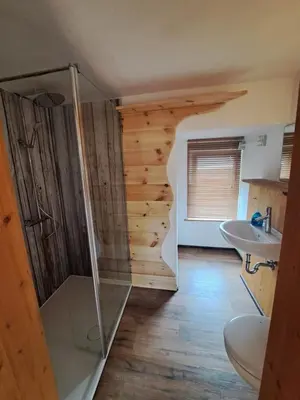 Ein Badezimmer in der Unterkunft Mäcky Baude