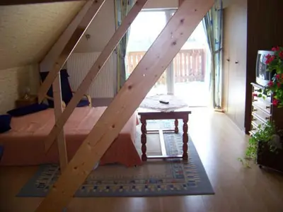 Ein Bett oder Betten in einem Zimmer der Unterkunft Gasthaus Falkenhain