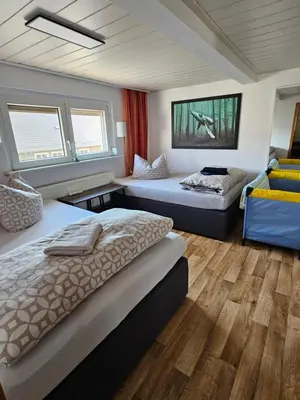 Ein Bett oder Betten in einem Zimmer der Unterkunft HässelHof - 80qm Ferienwohnung im Zentrum von Bad Liebenwerda