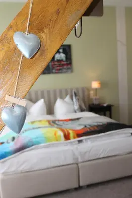 Ein Bett oder Betten in einem Zimmer der Unterkunft Boulevardhotel Sängerstadt - alle Zimmer klimatisiert
