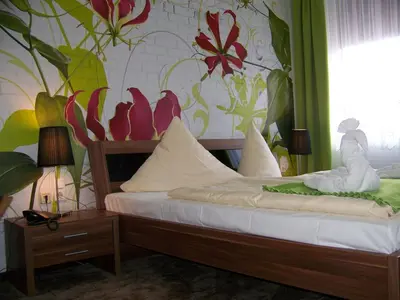 Ein Bett oder Betten in einem Zimmer der Unterkunft Boulevardhotel Sängerstadt - alle Zimmer klimatisiert
