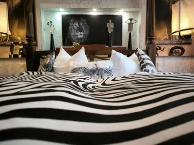 Ein Bett oder Betten in einem Zimmer der Unterkunft Boulevardhotel Sängerstadt - alle Zimmer klimatisiert