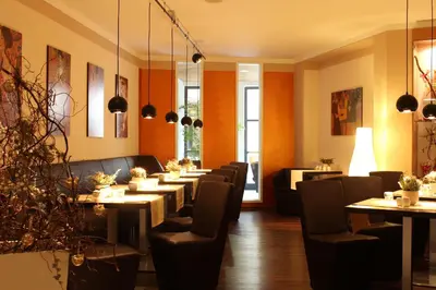 Ein Sitzbereich in der Unterkunft aktiv Sporthotel Sächsische Schweiz
