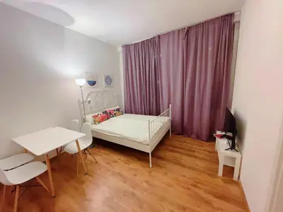 Ein Bett oder Betten in einem Zimmer der Unterkunft Familienfreundliches Apartment im Zentrum für Geschäftsreisen und privat