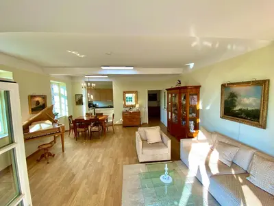 Ein Sitzbereich in der Unterkunft Ferienwohnung Natur und Kunst