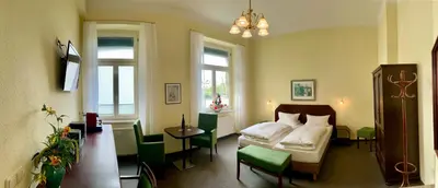 Ein Bett oder Betten in einem Zimmer der Unterkunft Apartmenthaus Stadt Metz