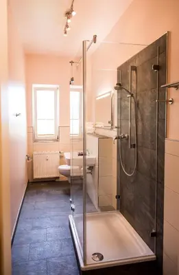Ein Badezimmer in der Unterkunft Apartmenthaus Stadt Metz