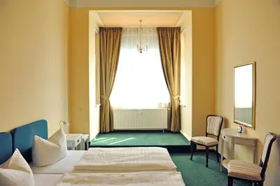 Ein Bett oder Betten in einem Zimmer der Unterkunft Apartmenthaus Stadt Metz