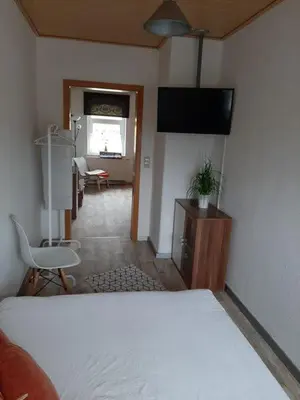 Ein Bett oder Betten in einem Zimmer der Unterkunft Ferienwohnung Bonny, Limbach-Oberfrohna
