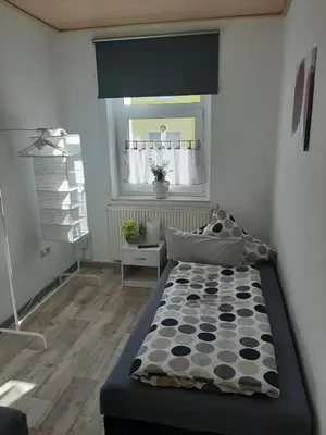 Ein Bett oder Betten in einem Zimmer der Unterkunft Ferienwohnung Bonny, Limbach-Oberfrohna