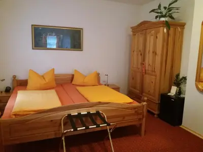 Ein Bett oder Betten in einem Zimmer der Unterkunft Gästehaus Loschwitz