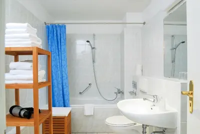 Ein Badezimmer in der Unterkunft Aparthotel am Zwinger
