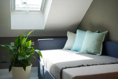 Ein Bett oder Betten in einem Zimmer der Unterkunft Aparthotel am Zwinger
