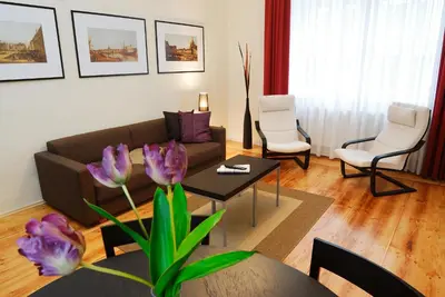 Ein Sitzbereich in der Unterkunft Aparthotel am Zwinger