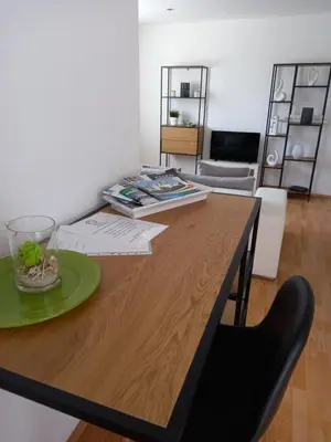Ein Sitzbereich in der Unterkunft Ferienwohnung Salzmannhaus