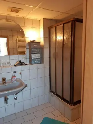 Ein Badezimmer in der Unterkunft Ferienwohnung Salzmannhaus