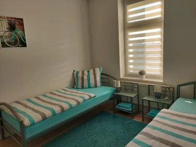 Ein Bett oder Betten in einem Zimmer der Unterkunft Apartments Irena Burkert