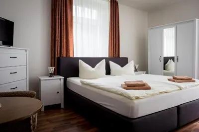 Ein Bett oder Betten in einem Zimmer der Unterkunft Villa Angelika