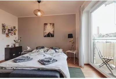 Ein Bett oder Betten in einem Zimmer der Unterkunft Die kleine „Louise“ in der Neustadt mit Tiefgarage