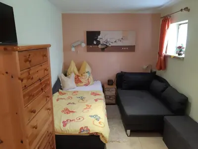 Ein Sitzbereich in der Unterkunft Ferienhaus Schelle