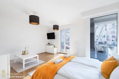 Ein Bett oder Betten in einem Zimmer der Unterkunft PINEAPPLE APARTMENTS - Zwinger IV - 65qm - 1x free parking