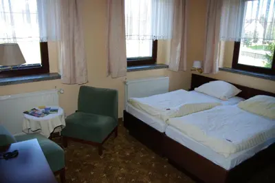 Ein Bett oder Betten in einem Zimmer der Unterkunft Landhotel Goldener Löwe