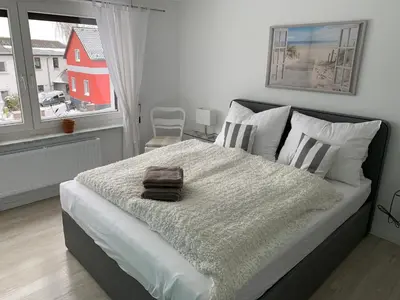 Ein Bett oder Betten in einem Zimmer der Unterkunft Pension Unikum Waldheim