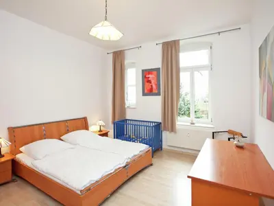 Ein Bett oder Betten in einem Zimmer der Unterkunft Peaceful Villa in Borstendorf