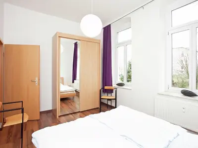 Ein Bett oder Betten in einem Zimmer der Unterkunft Peaceful Villa in Borstendorf